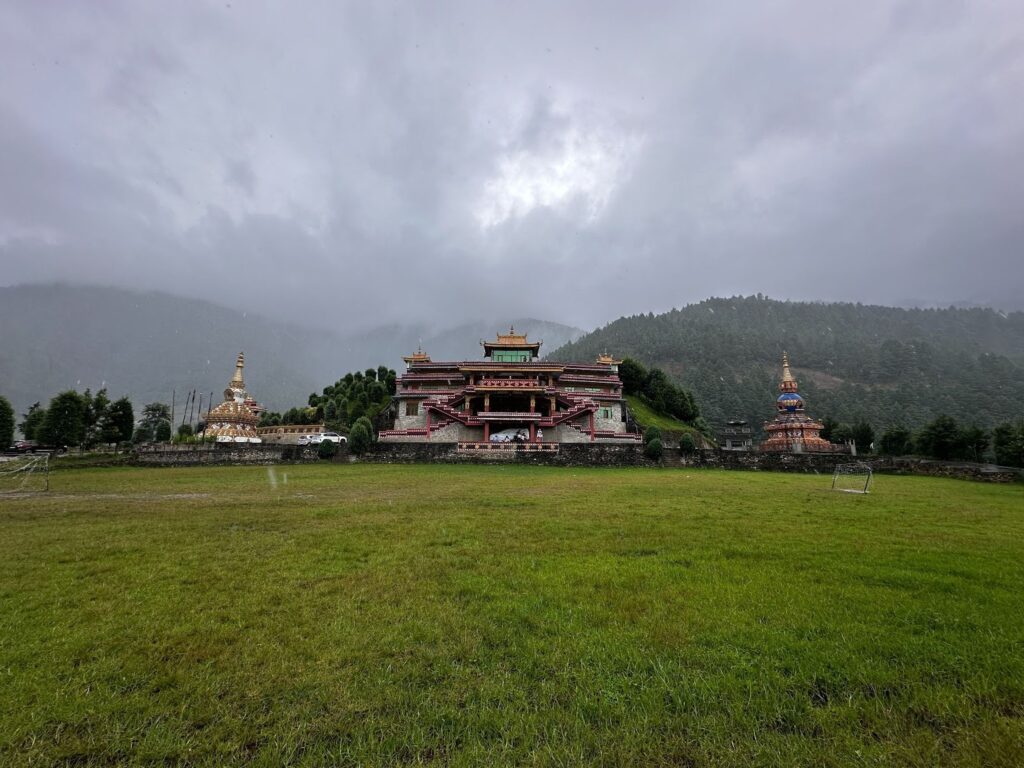 Grassy field and Monastery in Dirang Valley